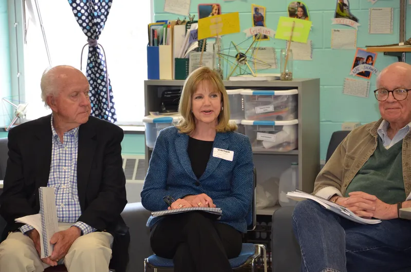 AmeriCorps members review their resumes during a career workshop.